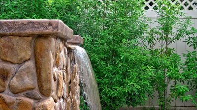 A waterfall made of rocks and stone Photo
